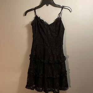 Windsor size S. Black Homecoming dress with zipper and adjustable straps.